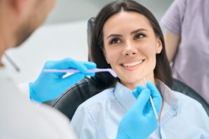 dentist using dental tools