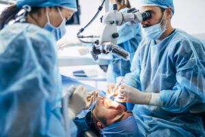 dental surgeons working on a patient